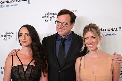 Bob Saget with daughter Lara (left) and wife Kelly (right) in June 2021