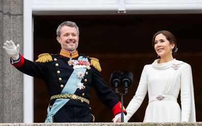 Danish King Frederik X and wife Queen Mary of Denmark after their proclamation by the Prime Minister, Mette Frederiksen on the balcony of Christiansborg Palace on January 14, 2024 in Copenhagen, Denmark. Her Majesty Queen Margrethe II steps down as Queen of Denmark and and entrusts the Danish throne to His Royal Highness The Crown Prince, who becomes His Majesty King Frederik X and Head of State of Denmark. (Photo by Samir Hussein/WireImage)