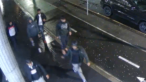 Police search for six men linked to serious assault in Sydney CBD.