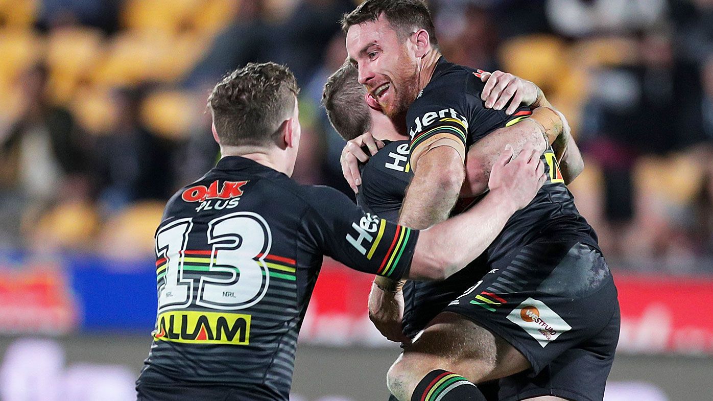 James Maloney of the Panthers (right) celebrates scoring the golden point in extra time