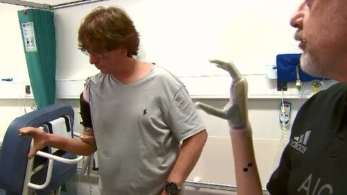 Arm amputees Alan Newey and Gerald Wilkie called the operation "life-changing." (9NEWS)