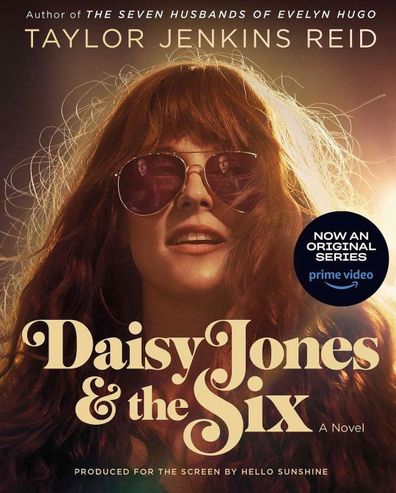 Riley Keough appears in a promotional image for Daisy Jones & The Six.