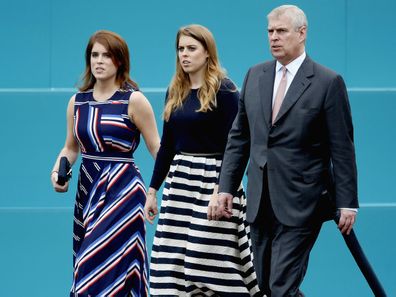 Prince Andrew with his daughters Princess Eugenie (left) and Princess Beatrice.