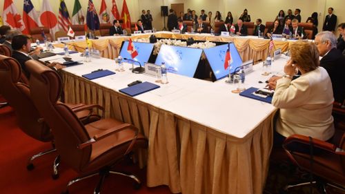 The empty seat allocated for Canada's Prime Minister Justin Trudeau at the Trans-Pacific Partnership leader's meeting. (AAP)