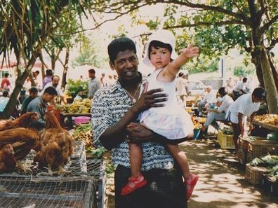 Jennifer Atilémile as a small child with her father.