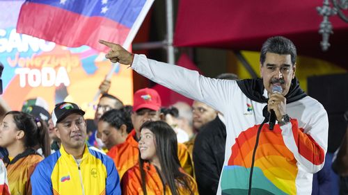 President Nicolas Maduro speaks to pro-government supporters after a referendum regarding Venezuela's claim to the Essequibo, a region administered and controlled by Guyana.