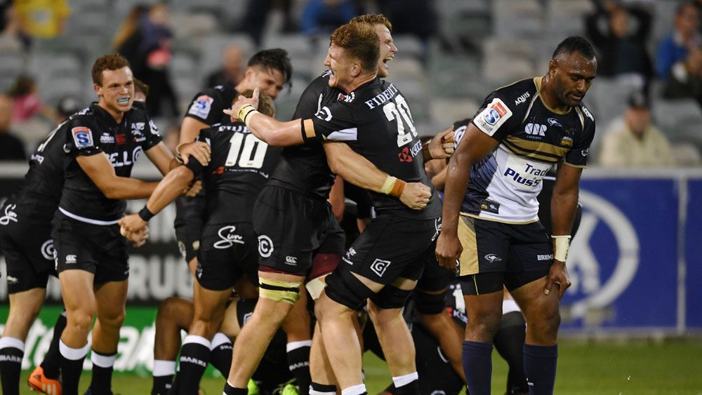 Celebrations after the Sharks score the match winning try against the Brumbies in Canberra. (AAP)