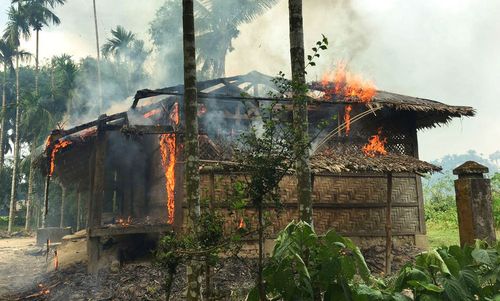 Houses are on fire in Gawdu Zara village, northern Rakhine state, Myanmar, Thursday, Sept. 7, 2017. Journalists saw new fires burning Thursday in the Myanmar village that had been abandoned by Rohingya Muslims. (AP)