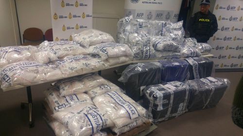 Men charged after police allegedly find $300m of ice hidden in metal gates from China 