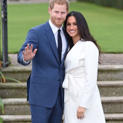 Prince Harry and Meghan Markle pose for their royal engagement photo call in the Sunken Garden at Kensington Palace in November 2017