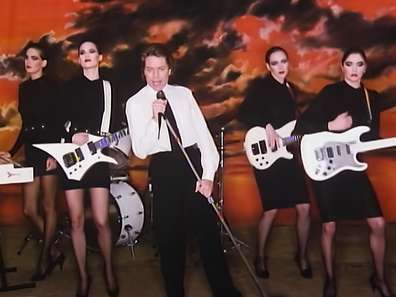 Robert Palmer and his dancers in the 'Addicted to Love' music video.