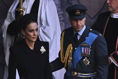 Britain's Catherine, Princess of Wales and Britain's Prince William leave after a service for the reception of Queen Elizabeth II's coffin at Westminster Hall, in the Palace of Westminster in London, Wednesday, Sept. 14, 2022. (Ben Stansall/Pool via AP)