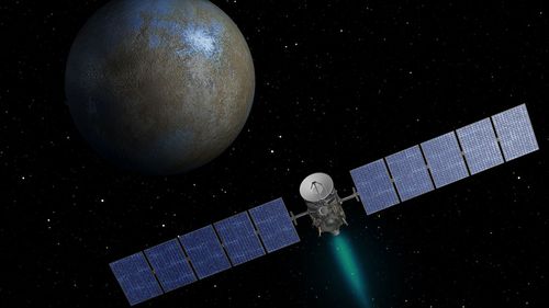 An artist's concept shows the Dawn spacecraft approaching the dwarf planet Ceres. (NASA/JPL-Caltech)