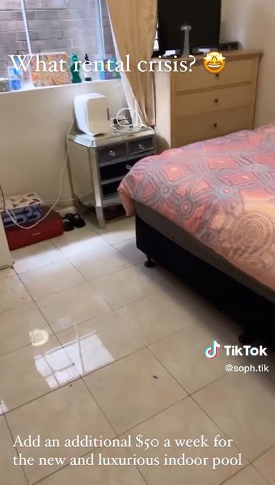 Landlord tells woman to use a couple of towels to clean ankle-length flooded water.