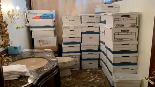 Boxes of records stored in a bathroom and shower in the Lake Room at Donald Trump's Mar-a-Lago estate.