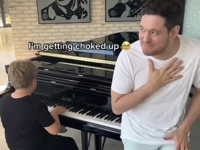 Singer Michael Bublé chokes up as son Noah accompanies him on piano to hit  song I'll Never Not Love You - 9Honey