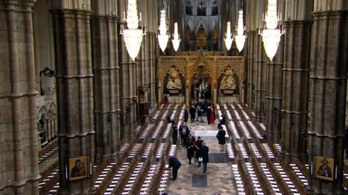 Guests file into Westminster Abbey for the Queen's funeral.