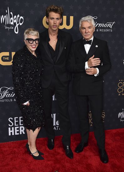 (L-R) Catherine Martin, Austin Butler and Baz Luhrmann arrive at the 28th annual Critics Choice Awards at The Fairmont Century Plaza Hotel on Sunday, Jan. 15, 2023, in Los Angeles.  