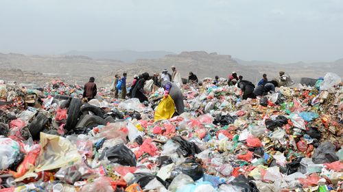 Yemenis search for items to be sold as war has put more than half the population on the brink of starvation (AAP)