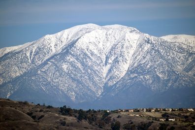 A snapshot of the snow-covered peak of Mount Baldy as seen from Los Angeles County, California.