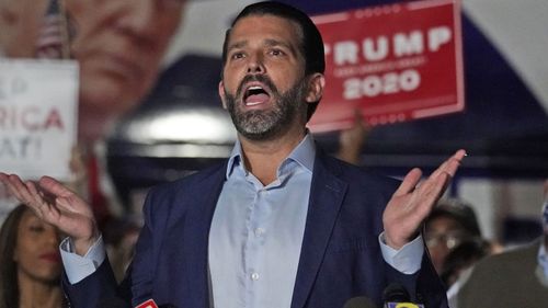 Donald Trump Jr., gestures during a news conference at Georgia Republican Party headquarters.