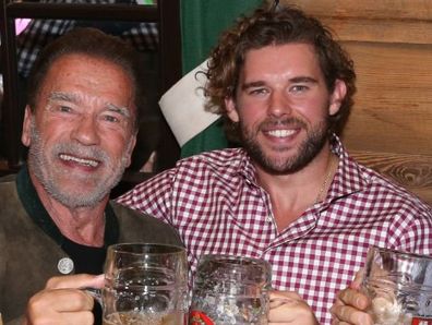 Arnold Schwarzenegger and sons Christopher Schwarzenegger and Patrick at Oktoberfest in Munich, Germany on September 24, 2022.