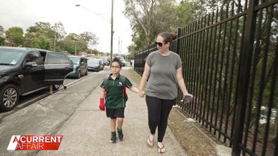 Leanne Collins and her son Brodie outside his school.