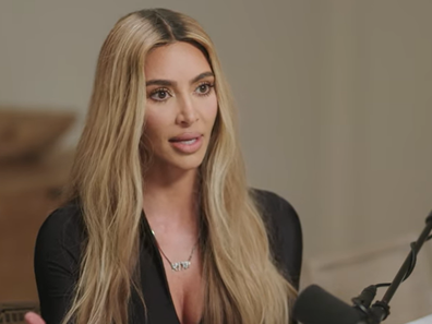 Kim Kardashian became emotional while talking about protecting her children during an interview on the Angie Martinez IRL podcast.