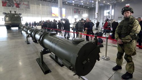 Russian military serviceman stands near the Iskander M Missile complex during a briefing on the issue of creation ground-based cruise missile 9M729 at Patriot military exhibition center in Moscow region, Russia.
