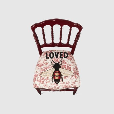 Wood chair with embroidered bee, $3,885