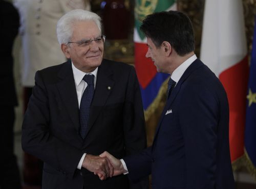 Italian President Sergio Mattarella, left, shakes hands with Prime Minister Giuseppe Conte during the swearing-in ceremony at the Quirinale Presidential Palace, in Rome (Photo: September, 2019)