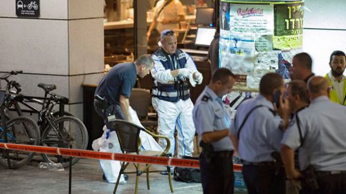 At least two gunmen opened fire at the Sarona Markets in Tel Aviv. (AAP)