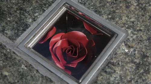 Each mirrored cube contains a handcrafted flower. (AAP)