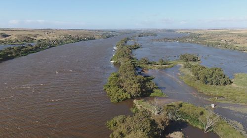 The River Murray is already swollen and expected to rise further prompting the South Australian premier to declare a 'major emergency'.