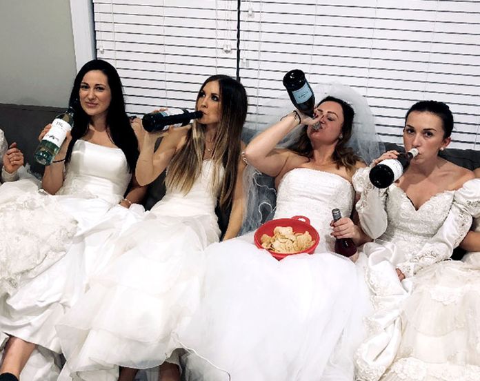 Woman throws divorce party in wedding dress, friends attend in theirs -  9Honey