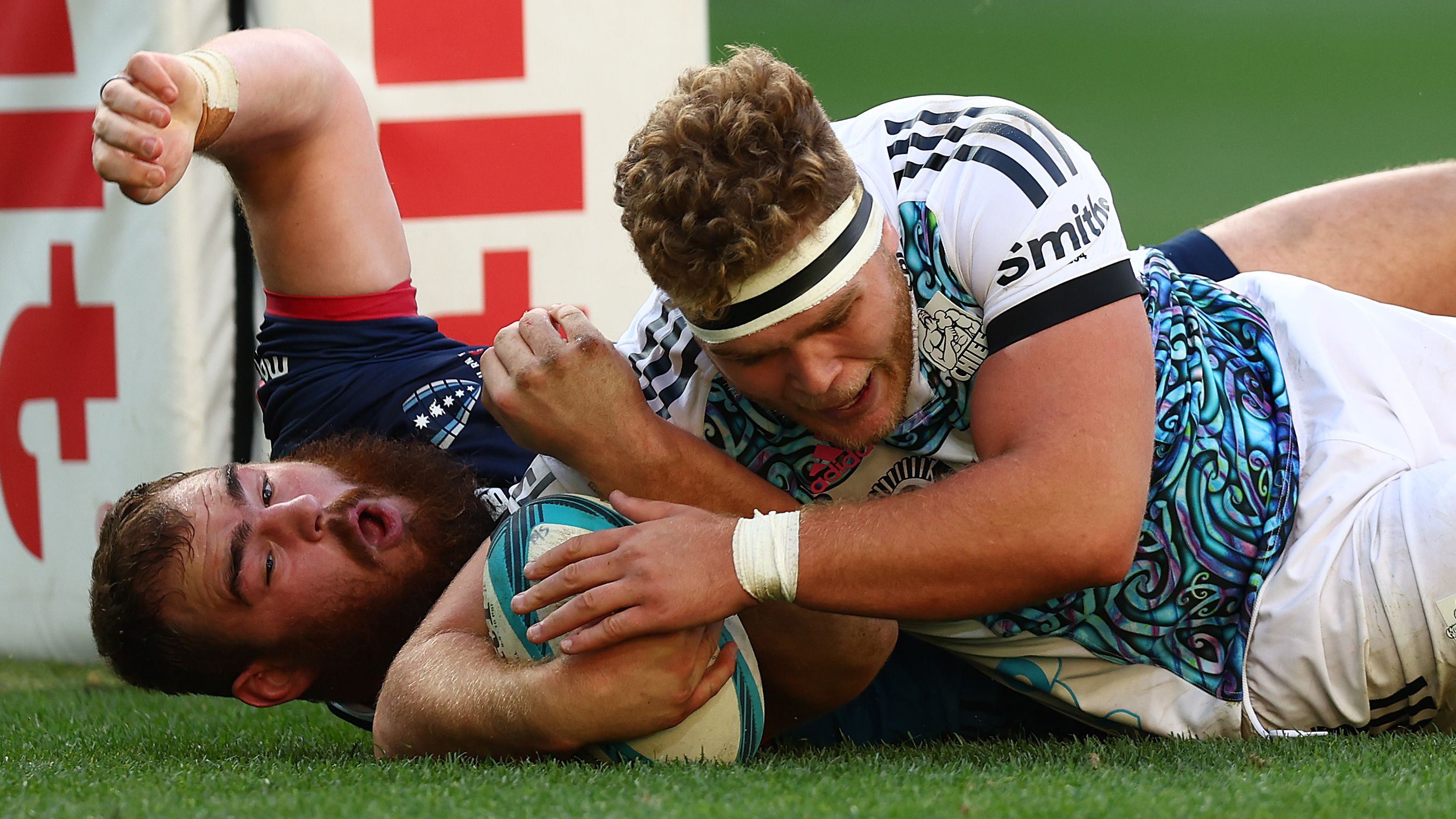 The Chiefs&#x27; Ollie Norris dives over the line to score the match-winning try against the Rebels. 
