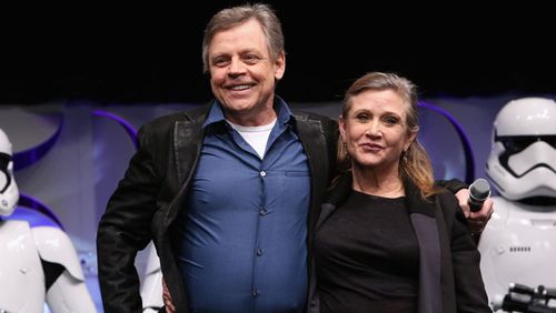 Carrie Fisher (l) with 'Star Wars' co-star Mark Hamill.