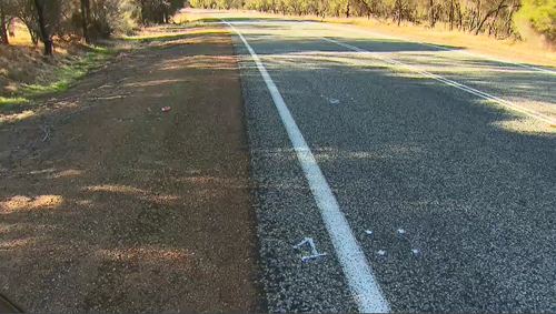 Authorities sprayed marks on the road following the crash.