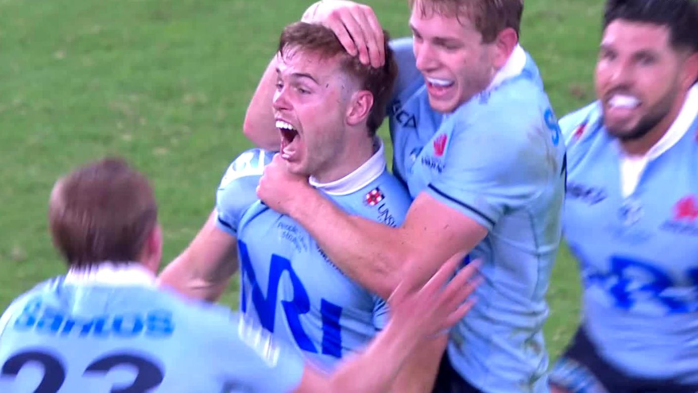 Waratahs celebrate their Golden Point win over the Crusaders at the Sydney Football Stadium.