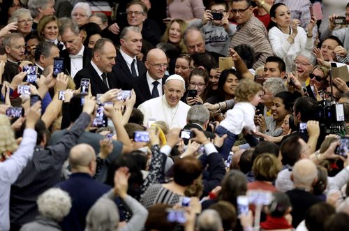 The Pontiff remains a favourite with the faithful on the streets. (AAP)