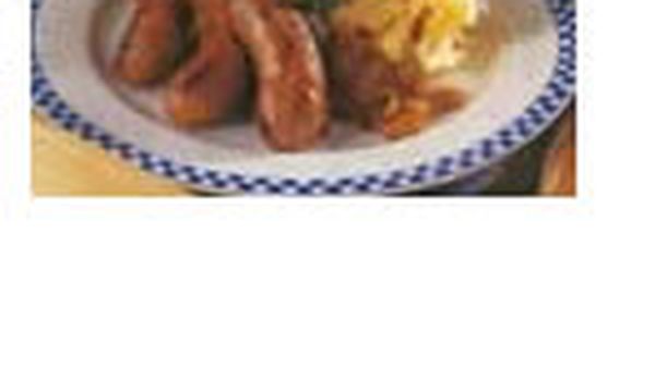 Sausages with sun-dried tomato mash