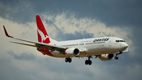 Alert Qantas pilots dodged jet collision: report