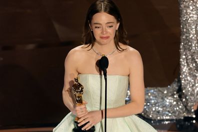 HOLLYWOOD, CALIFORNIA - MARCH 10: Emma Stone accepts the Lead Actress award for 