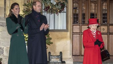 The Queen and the Duke and Duchess of Cambridge enjoy the performance.