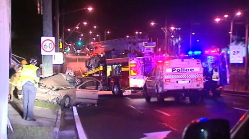 Woman critical after car slams into pole on the Gold Coast