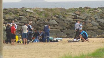 A boy has been struck by lightning on a beach south of Sydney.