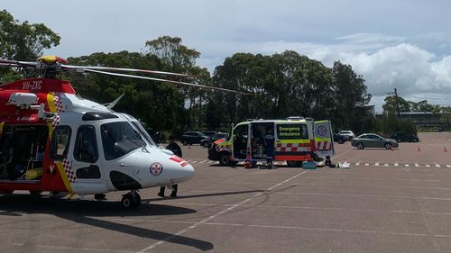 Woman charged after crashing into another car, injuring boy, at Killarney Vale.