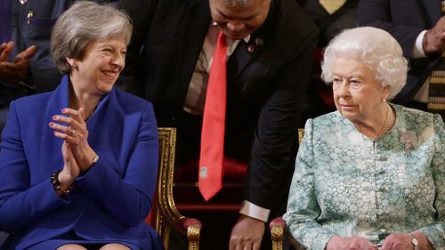 UK Prime Minister Theresa May and the Queen. (AAP)