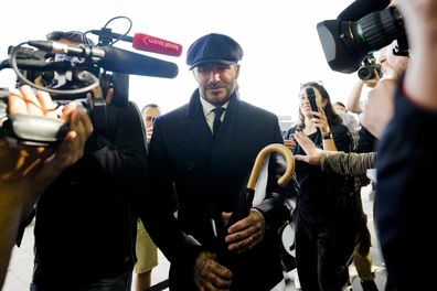 David Beckham is surrounded media as he leaves Westminster Palace paying respect to the late Queen Elizabeth II during the Lying-in State, in Westminster Hall, London, England, Friday, Sept. 16, 2022. 