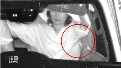 A Gold Coast man has been slapped with a fine after his partner's arm was captured out of her seatbelt by a detection camera.